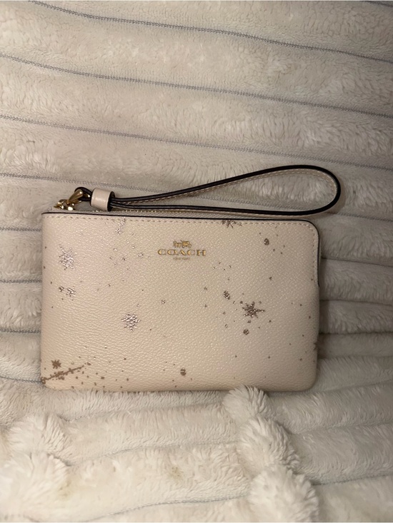 Coach Handbags - COACH Cream Wristlet with Metallic Star Print